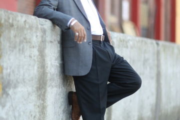 man in black suit jacket and black dress pants